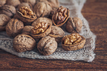 Walnuts on wooden background