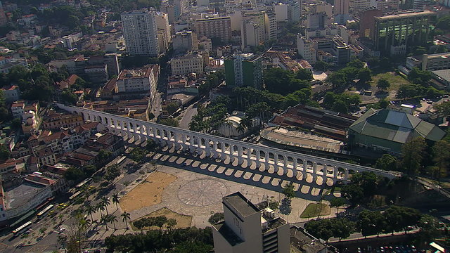 Aerial panning view of white Aqueduct landmark, Rio de Janeiro, Brazil