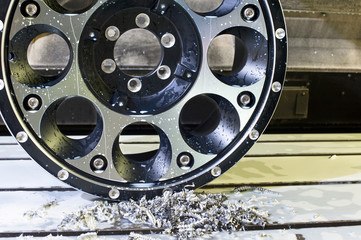 Car alloy black new rim in milling and lathe machine.