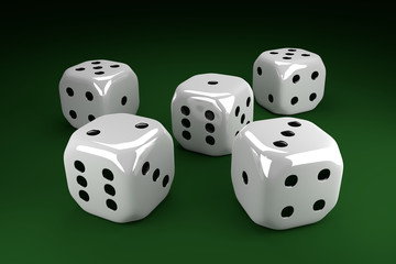 five dice lying on green table