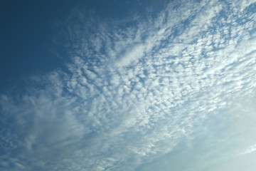 Naklejka na ściany i meble Blue sky with clouds / Blue sky with clouds use as background.