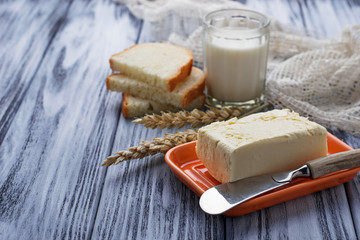 Glass of milk, bread and butter