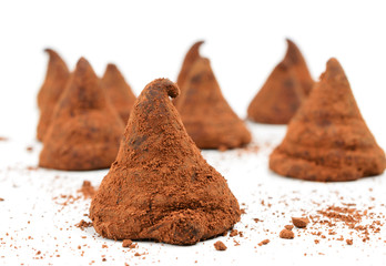 chocolate truffle candies on white background
