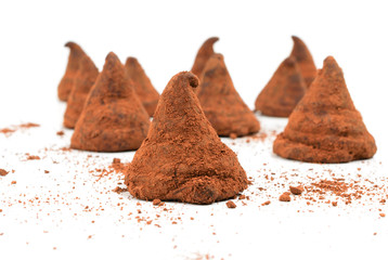chocolate truffle candies on white background