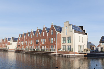 Naklejka premium New family homes with solar panels on the roof
