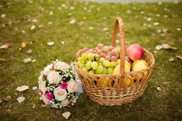 Wedding bouquet and bascet of fruits