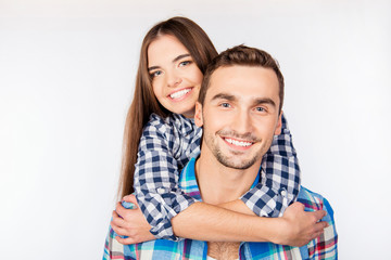 Fototapeta premium Pretty young woman embracing her boyfriend