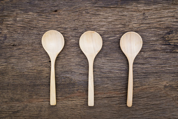 wooden spoon on wood table
