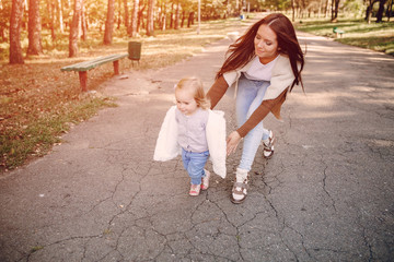 young family walking in the park