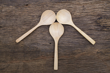 wooden spoon on wood table