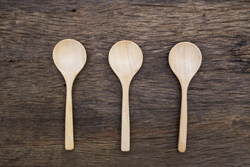 wooden spoon on wood table