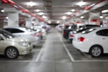 Fototapeta na wymiar Blur image, Underground parking with cars.