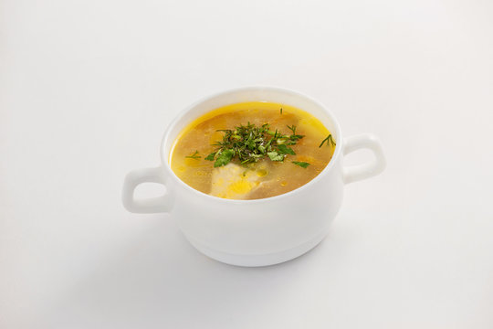 Closeup image of bowl with fresh chicken soup isolated 