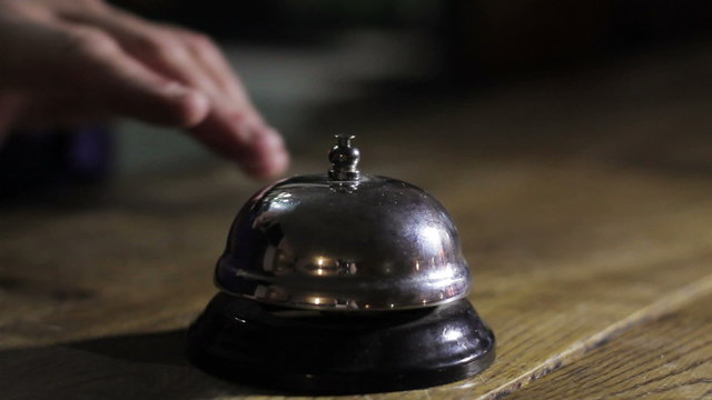 Modern hotel reception counter desk with bell