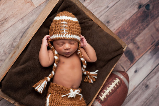 Newborn Baby Boy In Football Costume