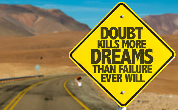 Doubt Kills More Dreams Than Failure Ever Will sign on desert road