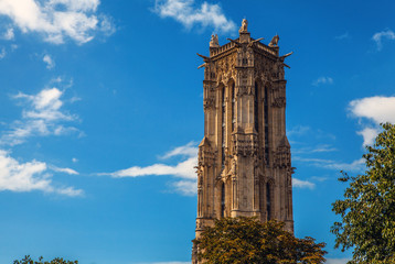 PARIS, FRANCE - AUGUST 30, 2015: Saint-Jacques Tower located on Rivoli street. This 52m Flamboyant Gothic tower is all that remains of former 16 century Church of Saint-Jacques-de-la-Boucherie. Paris.