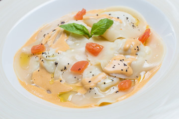 Tasty ravioli with parmesan