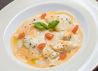 Tasty ravioli with parmesan