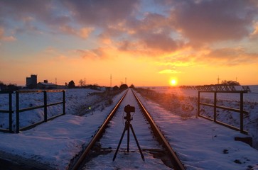 Fototapeta na wymiar Symmetry - Landscape with railroad tracks