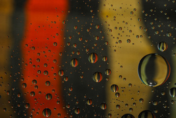 Close-up of multi-colored water droplets