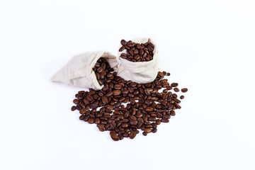 roasted coffee beans in a rag bags, roasted coffee beans on a wh
