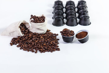 capsules of ground coffee for coffee, roasted coffee beans in a