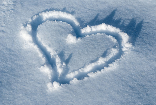 Lovely heart - painted on snow background