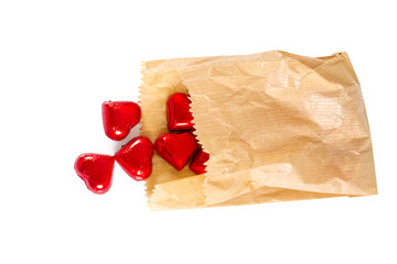 heart-shaped chocolates isolated on white