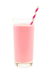 Strawberry milk in a glass with striped paper straw isolated on a white background