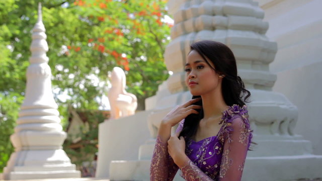 Asian Girl with Traditional Clothes in Temple