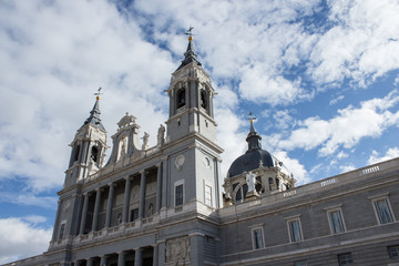 Fototapeta na wymiar Facade of Almudena Cathedral in the center of Madrid, Spain.