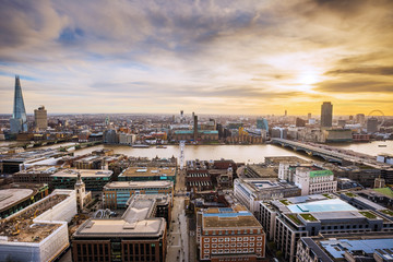Panoramic skyline view of south London from the top of St.Paul's Cathedral at sunset with blue sky...