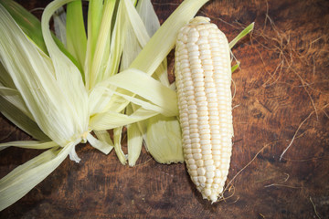 white corn on wooden background