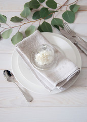 Fototapeta na wymiar Elegantly served table with linen napkins and silverware
