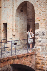 Fototapeta na wymiar Portrait of a girl at castelI