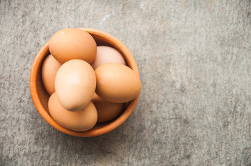 fresh eggs in pottery