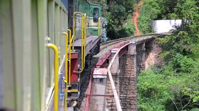 Train crossing railway bridge