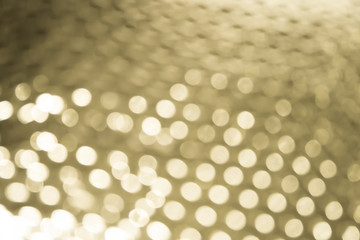 Abstract blurry light cercle of gold background
