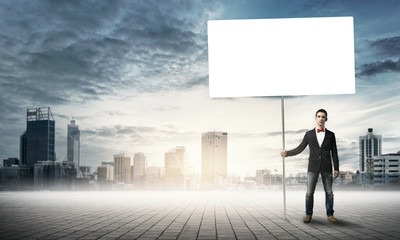 Guy with white billboard