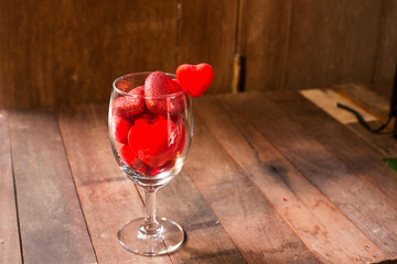 Wine Glass with Red Hearts on Valentine's Day