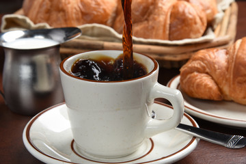 Pouring coffee