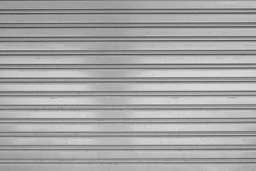 Obraz premium close-up detail of closed metal security shutter