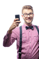 smiling man holding smartphone