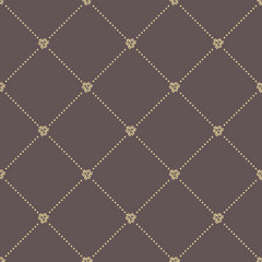 Geometric brown and golden ornament with dotted pattern. Seamless abstract background