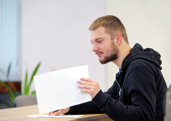 Man reading in office