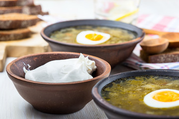 Organic sour cream and sorrel spinach soup