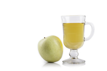 green Apple and glass of juice isolated on white