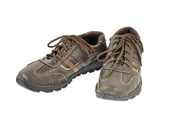 Pair of brown shoes isolated on white
