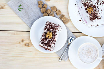 Delicious chocolate cake on plate on table on light background